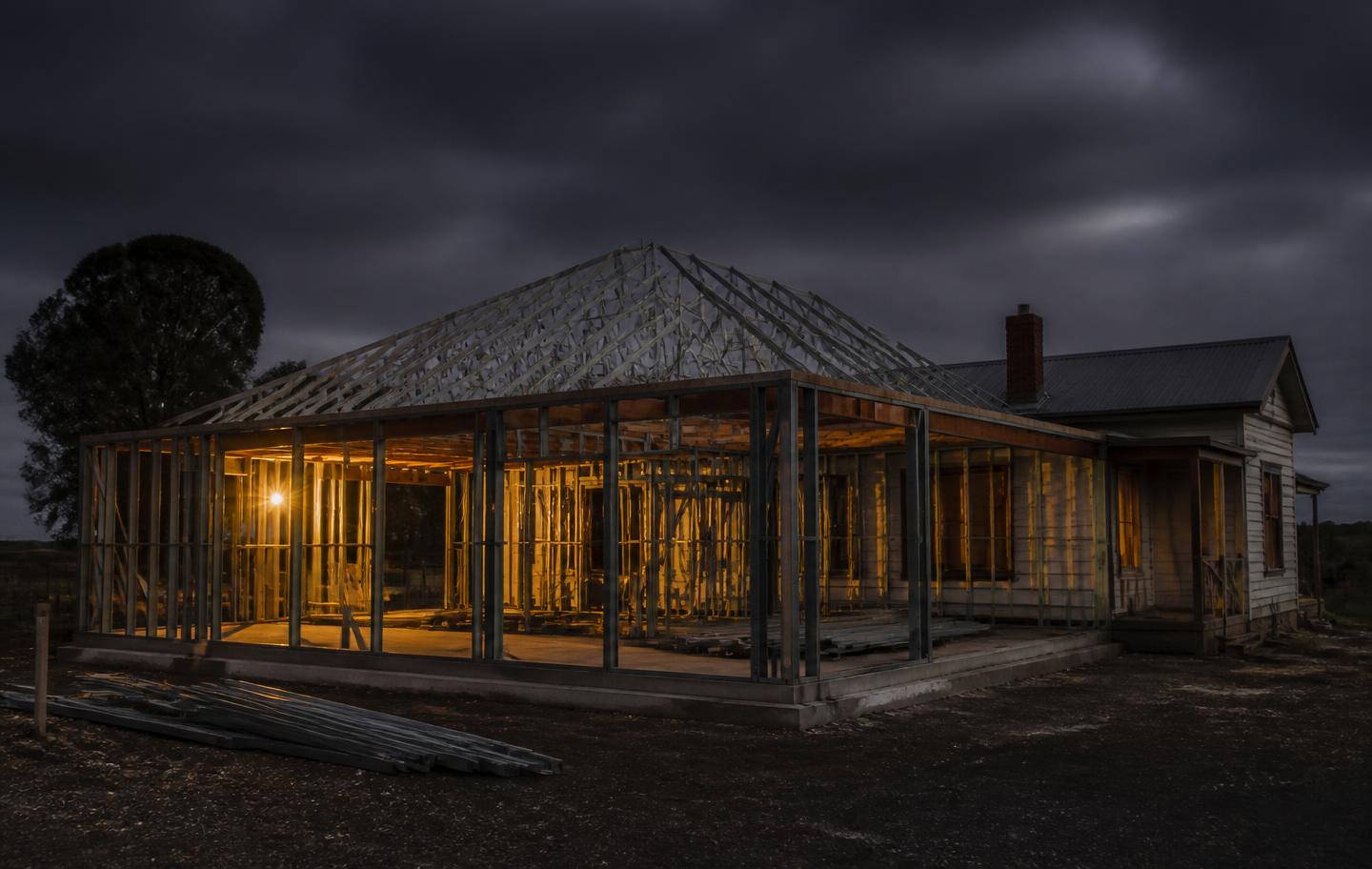Rural home extension under construction in the Central West at dusk